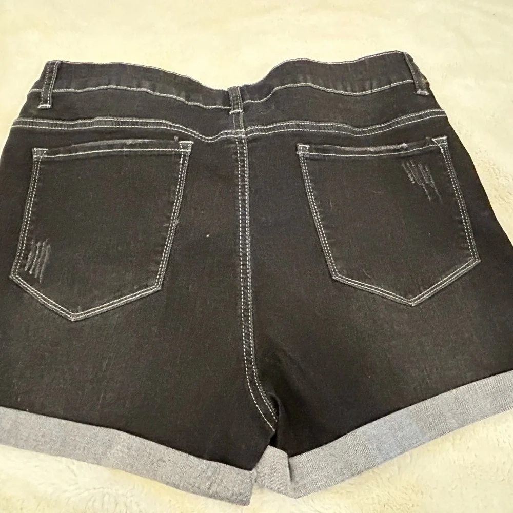 Jeans distressed denim shorts. NWT XL. Folded cuff. Black denim.